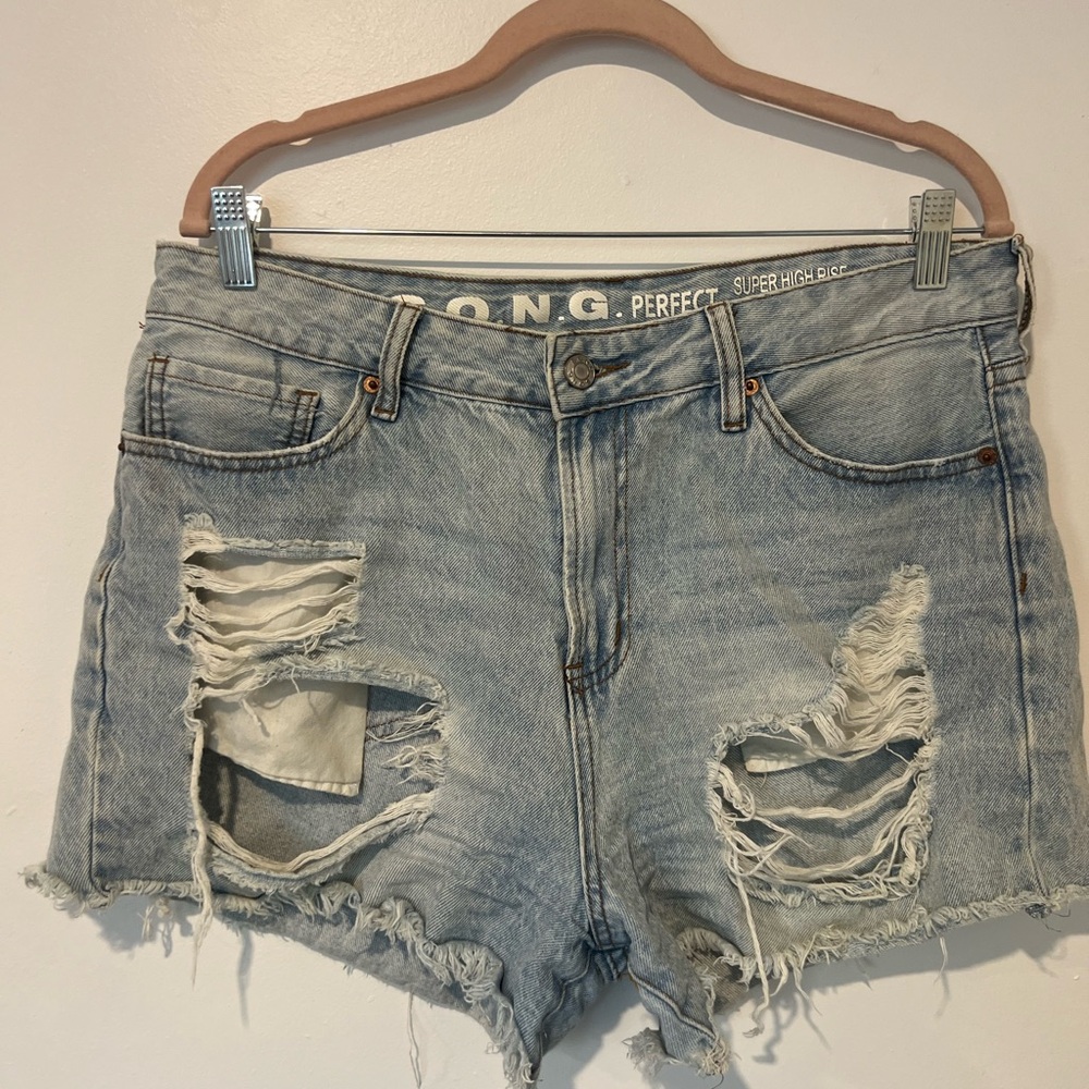 High Waist Blue Denim Shorts with Distressed Rips and Frayed Hem